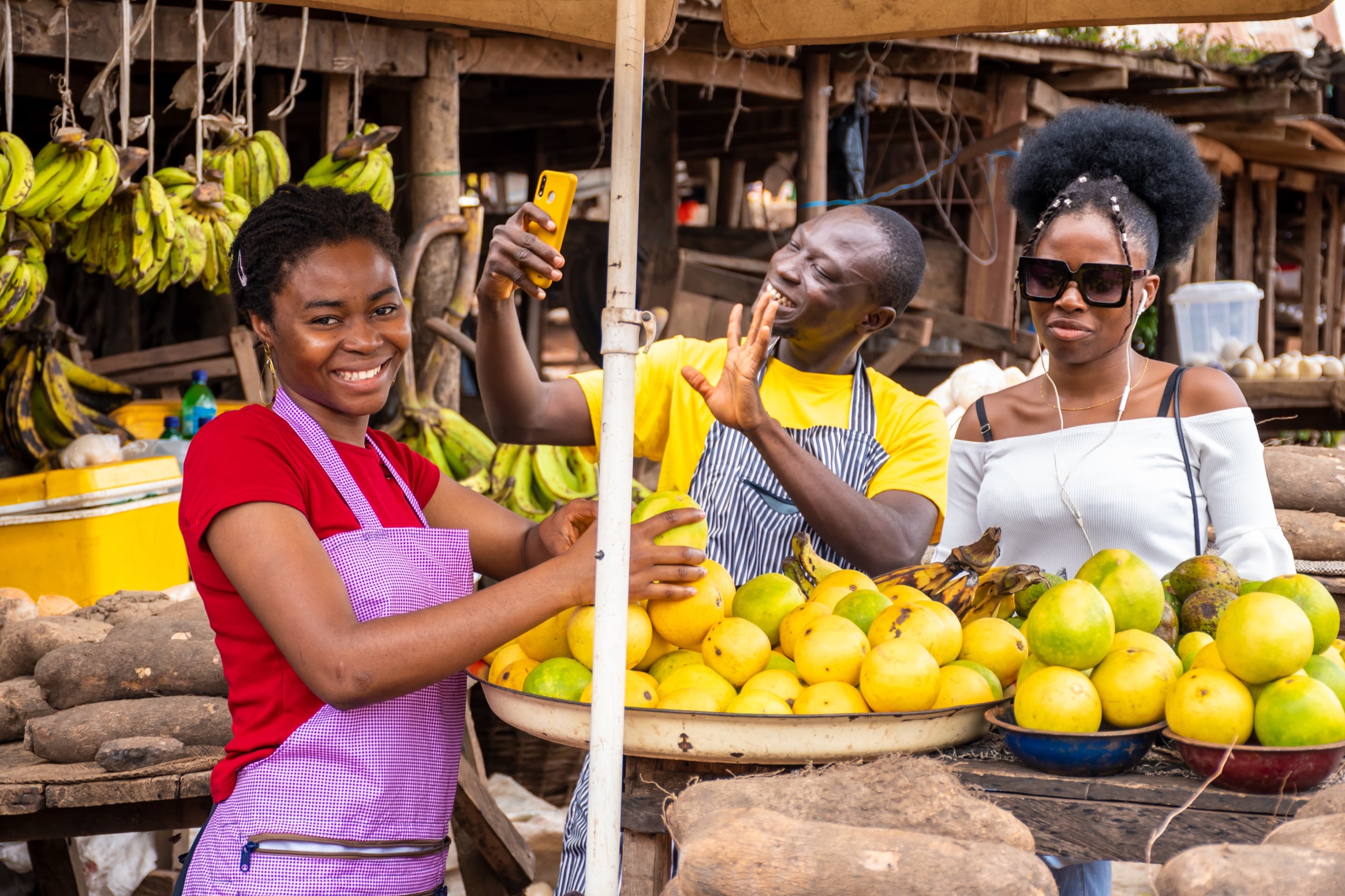 Traders at a busy fruit market
