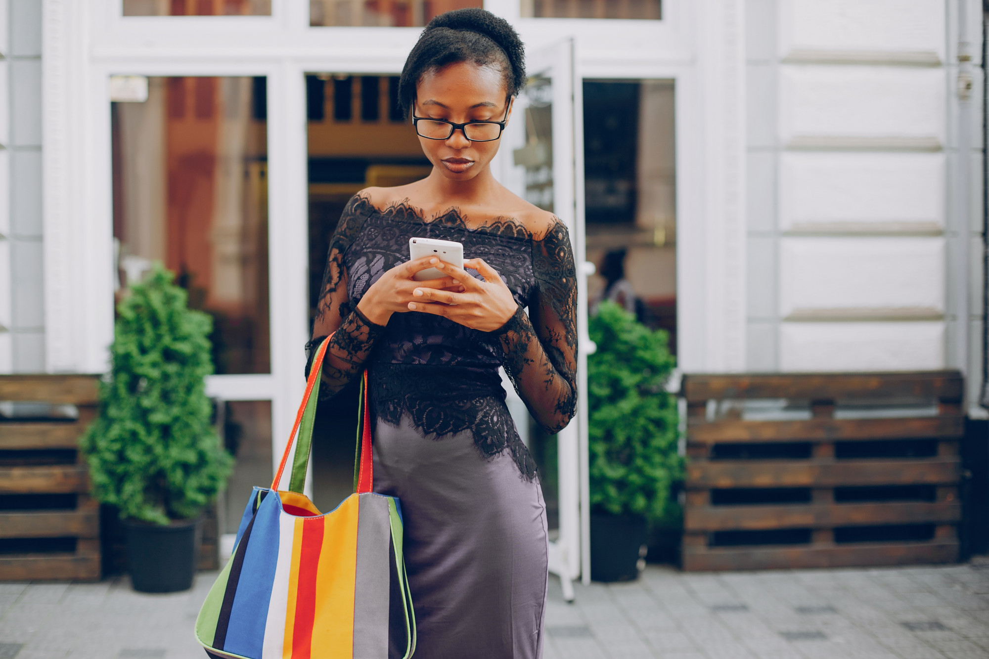 Ghanaian business owner using SupaKera Cloud POS to manage store orders